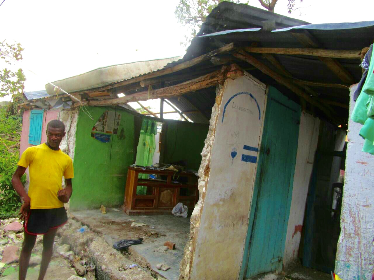 Man with intellectual disability outside his house