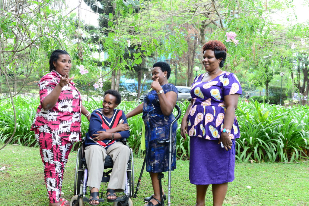 Gathering of women with disabilities talking about their successes