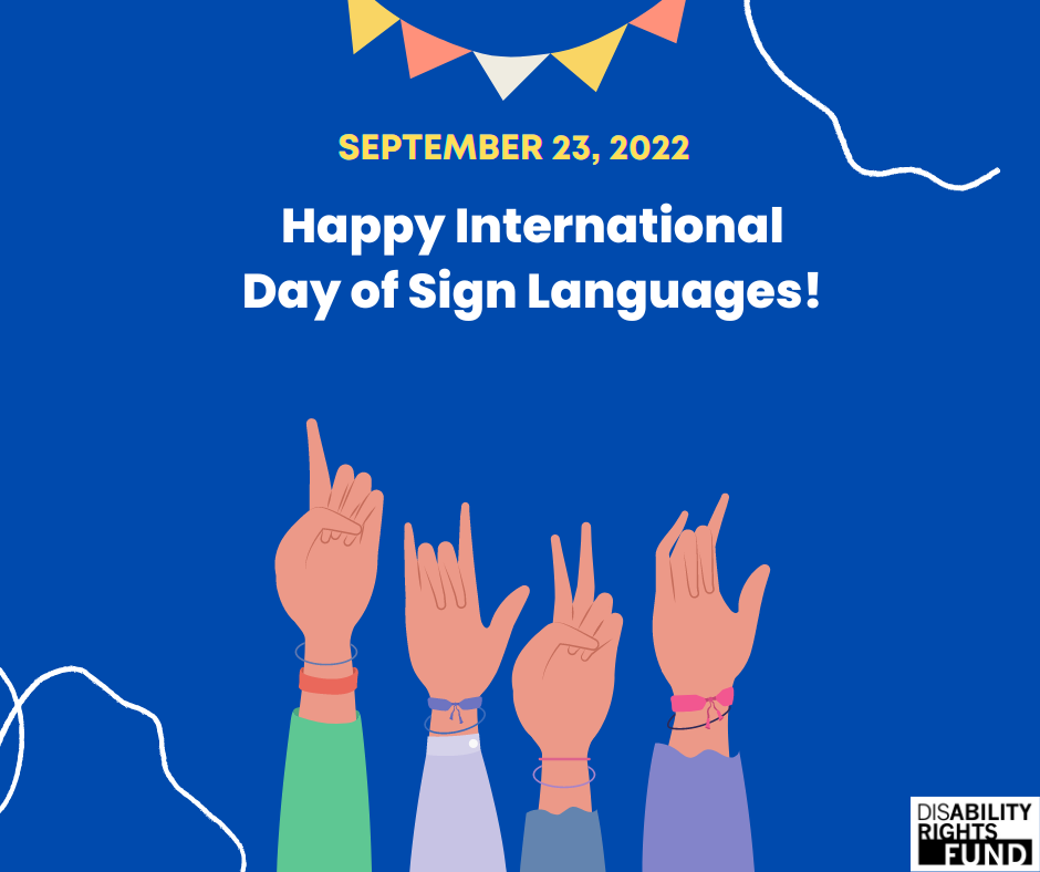 A blue graphic with the text: Happy International Day of Sign Languages. 