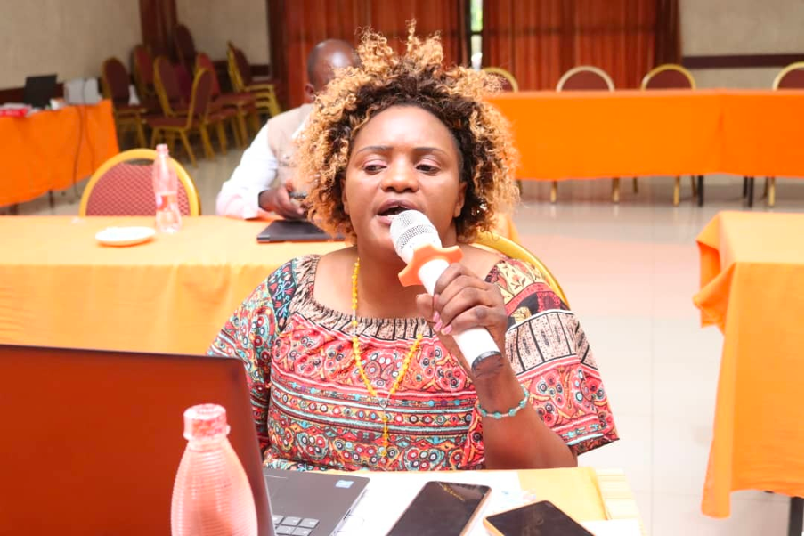 Photo of Stella Chisangwala Nkhoma speaking into the microphone